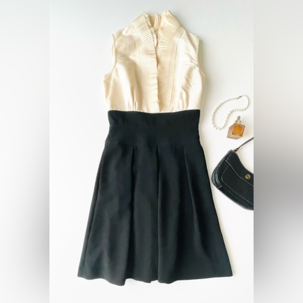 Elegant Black and Cream Sleeveless Dress